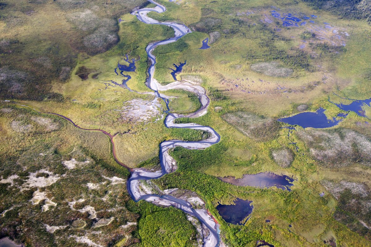 a-river-runs-through-a-valley-near-moose-pond-in-canadas-northwest-territories